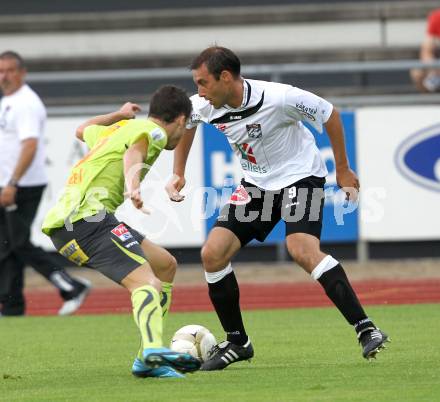 Fussball. Erste Liga. WAC/St. Andrae gegen FC PAX Gratkorn. Marco Reich (WAC), Zuendel Thomas (Gratkorn).  Wolfsberg, 13.7.2010. 
Foto: Kuess

---
pressefotos, pressefotografie, kuess, qs, qspictures, sport, bild, bilder, bilddatenbank