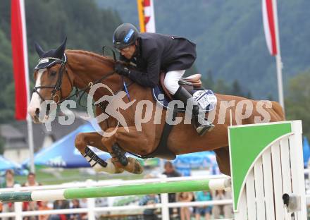 Springreiten. Kaerntner Meisterschaften. Christian Knoll auf Up To Day B. Treffen, am 18.7.2010.
Foto: Kuess
---
pressefotos, pressefotografie, kuess, qs, qspictures, sport, bild, bilder, bilddatenbank