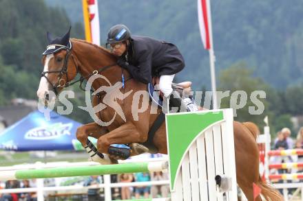 Springreiten. Kaerntner Meisterschaften. Christian Knoll auf Up To Day B. Treffen, am 18.7.2010.
Foto: Kuess
---
pressefotos, pressefotografie, kuess, qs, qspictures, sport, bild, bilder, bilddatenbank