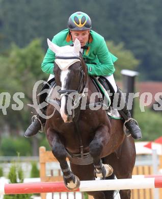 Springreiten. Kaerntner Meisterschaften. Dieter Koefler auf Casper 150. Treffen, am 18.7.2010.
Foto: Kuess
---
pressefotos, pressefotografie, kuess, qs, qspictures, sport, bild, bilder, bilddatenbank