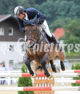 Springreiten. Kaerntner Meisterschaften. Fritz Kogelnig jun. auf Pedro 845. Treffen, am 18.7.2010.
Foto: Kuess
---
pressefotos, pressefotografie, kuess, qs, qspictures, sport, bild, bilder, bilddatenbank