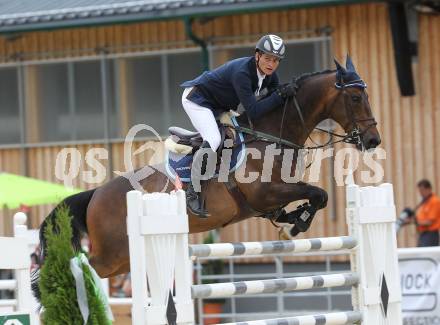 Springreiten. Kaerntner Meisterschaften. Fritz Kogelnig jun. auf Pedro 845. Treffen, am 18.7.2010.
Foto: Kuess
---
pressefotos, pressefotografie, kuess, qs, qspictures, sport, bild, bilder, bilddatenbank