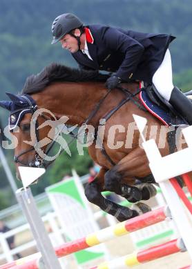 Springreiten. Kaerntner Meisterschaften. Andreas Bauer auf Lando 281. Treffen, am 18.7.2010.
Foto: Kuess
---
pressefotos, pressefotografie, kuess, qs, qspictures, sport, bild, bilder, bilddatenbank