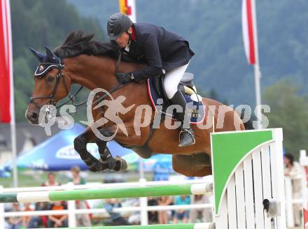 Springreiten. Kaerntner Meisterschaften. Andreas Bauer auf Lando 281. Treffen, am 18.7.2010.
Foto: Kuess
---
pressefotos, pressefotografie, kuess, qs, qspictures, sport, bild, bilder, bilddatenbank