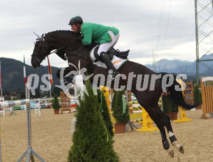 Springreiten. Kaerntner Meisterschaften. Dieter Koefler auf Casper 150. Treffen, am 18.7.2010.
Foto: Kuess
---
pressefotos, pressefotografie, kuess, qs, qspictures, sport, bild, bilder, bilddatenbank