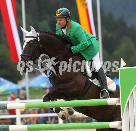 Springreiten. Kaerntner Meisterschaften. Dieter Koefler auf Casper 150. Treffen, am 18.7.2010.
Foto: Kuess
---
pressefotos, pressefotografie, kuess, qs, qspictures, sport, bild, bilder, bilddatenbank