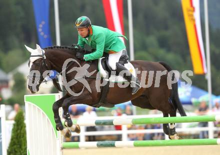 Springreiten. Kaerntner Meisterschaften. Dieter Koefler auf Casper 150. Treffen, am 18.7.2010.
Foto: Kuess
---
pressefotos, pressefotografie, kuess, qs, qspictures, sport, bild, bilder, bilddatenbank