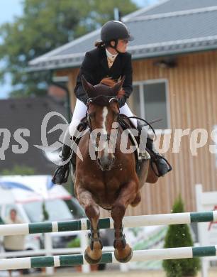 Springreiten. Kaerntner Meisterschaften. Marianne Schindele auf Irish Pepper. Treffen, am 18.7.2010.
Foto: Kuess
---
pressefotos, pressefotografie, kuess, qs, qspictures, sport, bild, bilder, bilddatenbank