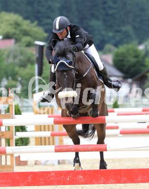 Springreiten. Kaerntner Meisterschaften. Ulrich Domaingo auf Darkness Delight. Treffen, am 18.7.2010.
Foto: Kuess
---
pressefotos, pressefotografie, kuess, qs, qspictures, sport, bild, bilder, bilddatenbank