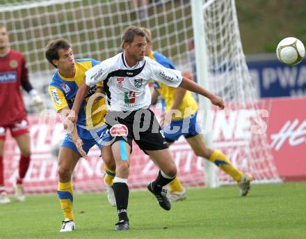 Fussball. Erste Liga. WAC/St. Andrae gegen Vienna FC. Gernot Messner, (WAC), Marcel Toth (Vienna).  Wolfsberg, 23.7.2010. 
Foto: Kuess

---
pressefotos, pressefotografie, kuess, qs, qspictures, sport, bild, bilder, bilddatenbank