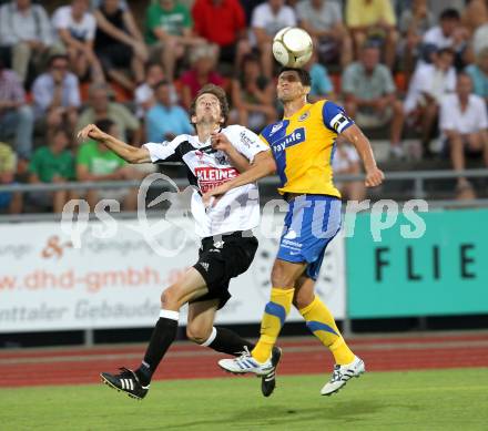 Fussball. Erste Liga. WAC/St. Andrae gegen Vienna FC. Christian Falk,  (WAC), Rodrigo Pareira (Vienna).  Wolfsberg, 23.7.2010. 
Foto: Kuess

---
pressefotos, pressefotografie, kuess, qs, qspictures, sport, bild, bilder, bilddatenbank