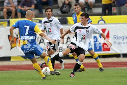 Fussball. Erste Liga. WAC/St. Andrae gegen Vienna FC. Roland Putsche,  (WAC), Richard Strohmayer (Vienna).  Wolfsberg, 23.7.2010. 
Foto: Kuess

---
pressefotos, pressefotografie, kuess, qs, qspictures, sport, bild, bilder, bilddatenbank