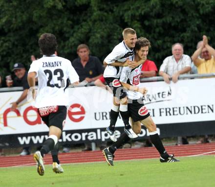 Fussball. Erste Liga. WAC/St. Andrae gegen Vienna FC. Torjubel Manuel Kerhe, Christian Falk (WAC).  Wolfsberg, 23.7.2010. 
Foto: Kuess

---
pressefotos, pressefotografie, kuess, qs, qspictures, sport, bild, bilder, bilddatenbank