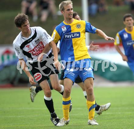 Fussball. Erste Liga. WAC/St. Andrae gegen Vienna FC. Christian Falk, (WAC), Christian Balga (Vienna).  Wolfsberg, 23.7.2010. 
Foto: Kuess

---
pressefotos, pressefotografie, kuess, qs, qspictures, sport, bild, bilder, bilddatenbank