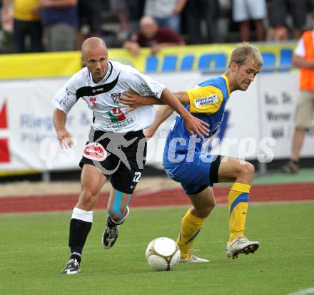 Fussball. Erste Liga. WAC/St. Andrae gegen Vienna FC. Stephan Stueckler, (WAC), Christian Balga (Vienna).  Wolfsberg, 23.7.2010. 
Foto: Kuess

---
pressefotos, pressefotografie, kuess, qs, qspictures, sport, bild, bilder, bilddatenbank