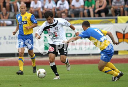 Fussball. Erste Liga. WAC/St. Andrae gegen Vienna FC. Sandro Zakany,  (WAC), Richard Strohmayer, Marco Salvatore (Vienna).  Wolfsberg, 23.7.2010. 
Foto: Kuess

---
pressefotos, pressefotografie, kuess, qs, qspictures, sport, bild, bilder, bilddatenbank