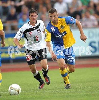 Fussball. Erste Liga. WAC/St. Andrae gegen Vienna FC. Roland Putsche, (WAC), Eldar Topic (Vienna).  Wolfsberg, 23.7.2010. 
Foto: Kuess

---
pressefotos, pressefotografie, kuess, qs, qspictures, sport, bild, bilder, bilddatenbank