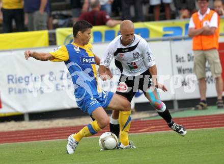 Fussball. Erste Liga. WAC/St. Andrae gegen Vienna FC. Stephan Stueckler, (WAC), Rodrigo Pareira (Vienna).  Wolfsberg, 23.7.2010. 
Foto: Kuess

---
pressefotos, pressefotografie, kuess, qs, qspictures, sport, bild, bilder, bilddatenbank