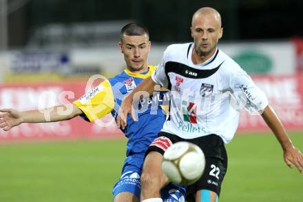 Fussball. Erste Liga. WAC/St. Andrae gegen Vienna FC. Stephan Stueckler, (WAC), Marko Milutinovic (Vienna).  Wolfsberg, 23.7.2010. 
Foto: Kuess

---
pressefotos, pressefotografie, kuess, qs, qspictures, sport, bild, bilder, bilddatenbank