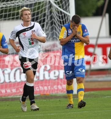 Fussball. Erste Liga. WAC/St. Andrae gegen Vienna FC. Michael Sollbauer (WAC), Eldar Topic (Vienna).  Wolfsberg, 23.7.2010. 
Foto: Kuess

---
pressefotos, pressefotografie, kuess, qs, qspictures, sport, bild, bilder, bilddatenbank