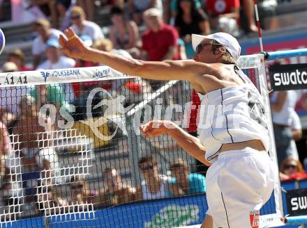 Beachvolleyball Grand Slam.  Joerg Wutzl. Klagenfurt, 28.7.2010.
Foto: Kuess

---
pressefotos, pressefotografie, kuess, qs, qspictures, sport, bild, bilder, bilddatenbank