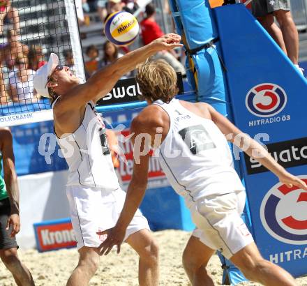 Beachvolleyball Grand Slam. Michael Leeb, Joerg Wutzl. Klagenfurt, 28.7.2010.
Foto: Kuess

---
pressefotos, pressefotografie, kuess, qs, qspictures, sport, bild, bilder, bilddatenbank