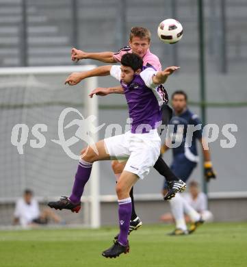 Fussball Testspiel. SK Austria Klagenfurt gegen US Palermo. Stephan Buergler (Klagenfurt), Dorin Goian (Palermo). Klagenfurt, am 28.7.2010.
Foto: Kuess
---
pressefotos, pressefotografie, kuess, qs, qspictures, sport, bild, bilder, bilddatenbank