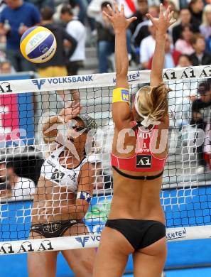 Beachvolleyball Grand Slam. Sara Montagnolli, Stefanie Schwaiger.  Klagenfurt, 30.7.2010.
Foto: Kuess

---
pressefotos, pressefotografie, kuess, qs, qspictures, sport, bild, bilder, bilddatenbank