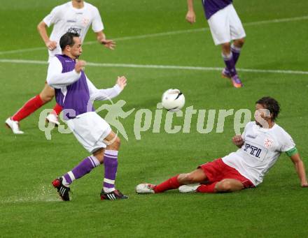Fussball. Regionalliga. SK Austria Klagenfurt gegen Union St. Florian . Matthias Dollinger, (Klagenfurt), Thomas Groebl (St.Florian). Klagenfurt, 6.8.2010. 
Foto: Kuess

---
pressefotos, pressefotografie, kuess, qs, qspictures, sport, bild, bilder, bilddatenbank