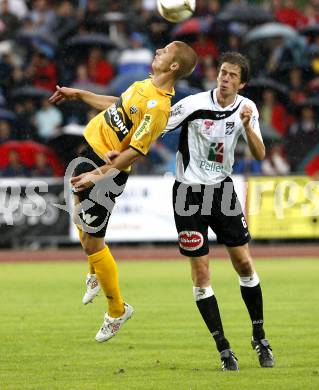 Fussball. Erste Liga. WAC/St. Andrae gegen SCR Altach. Falk Christian (WAC), Netzer Philipp (Altach).  Wolfsberg, 6.8.2010. 
Foto: Kuess

---
pressefotos, pressefotografie, kuess, qs, qspictures, sport, bild, bilder, bilddatenbank