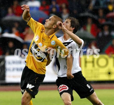 Fussball. Erste Liga. WAC/St. Andrae gegen SCR Altach. Falk Christian (WAC), Netzer Philipp (Altach).  Wolfsberg, 6.8.2010. 
Foto: Kuess

---
pressefotos, pressefotografie, kuess, qs, qspictures, sport, bild, bilder, bilddatenbank