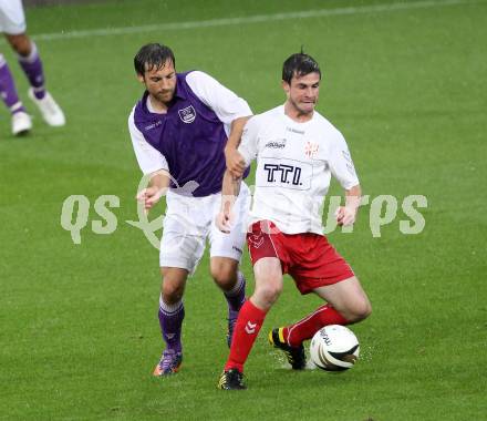 Fussball. Regionalliga. SK Austria Klagenfurt gegen Union St. Florian . Helmut Koenig, (Klagenfurt), Daniel Guselbauer (St.Florian). Klagenfurt, 6.8.2010. 
Foto: Kuess

---
pressefotos, pressefotografie, kuess, qs, qspictures, sport, bild, bilder, bilddatenbank