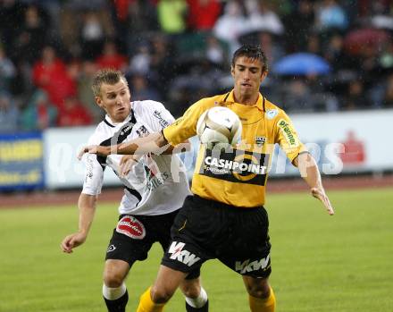 Fussball. Erste Liga. WAC/St. Andrae gegen SCR Altach. Kerhe Manuel (WAC), Suppan Gernot (Altach).  Wolfsberg, 6.8.2010. 
Foto: Kuess

---
pressefotos, pressefotografie, kuess, qs, qspictures, sport, bild, bilder, bilddatenbank