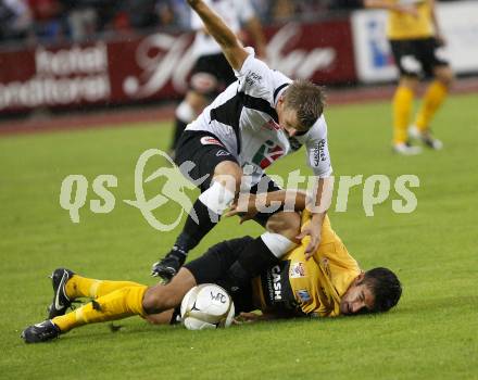 Fussball. Erste Liga. WAC/St. Andrae gegen SCR Altach. Kerhe Manuel (WAC), Suppan Gernot (Altach).  Wolfsberg, 6.8.2010. 
Foto: Kuess

---
pressefotos, pressefotografie, kuess, qs, qspictures, sport, bild, bilder, bilddatenbank