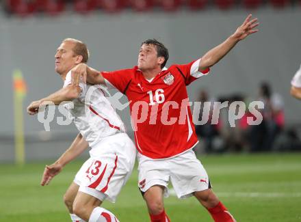 Fussball. Freundschaftsspiel. Oesterreich gegen Schweiz. Zlatko Junuzovic, (Oesterreich), Stephane Grichting (Schweiz). Klagenfurt, 11.8.2010. 
Foto: Kuess

---
pressefotos, pressefotografie, kuess, qs, qspictures, sport, bild, bilder, bilddatenbank