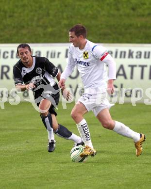 Fusball Kaerntner Liga. St. Veit gegen Spittal. Rebernig Michael (St.Veit), Pichorner Juergen (Spittal). St. Veit, 13.8.2010. 
Foto: Kuess
---
pressefotos, pressefotografie, kuess, qs, qspictures, sport, bild, bilder, bilddatenbank