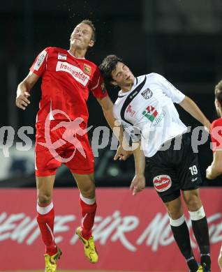 Fussball 1. Liga. RZ Pellets WAC/St. Andrae gegen Trenkwalder Admira. Roland Putsche,  (WAC), Marcus Hanikel (Admira): Wolfsberg, 20.8.2010.
Foto: Kuess

---
pressefotos, pressefotografie, kuess, qs, qspictures, sport, bild, bilder, bilddatenbank