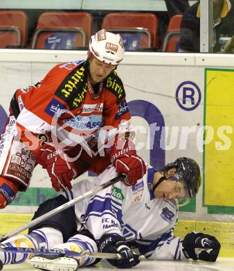 Eishockey Testspiel. EC KAC gegen Kassel Huskies. Mike Craig,  (KAC),  Christopher Schmidt (Kassel Huskies). Klagenfurt, am 22.8.2010.
Foto: Kuess 

---
pressefotos, pressefotografie, kuess, qs, qspictures, sport, bild, bilder, bilddatenbank