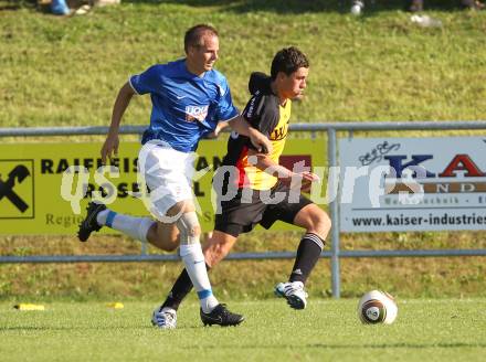 Fussball Unterliga Ost. ASKOE Koettmannsdorf gegen SV Kraig. Gabor Ferenczi (Koettmannsdorf), Rene Hohlmann (Kraig). Koettmannsdorf, am 22.8.2010.
Foto: Kuess
---
pressefotos, pressefotografie, kuess, qs, qspictures, sport, bild, bilder, bilddatenbank