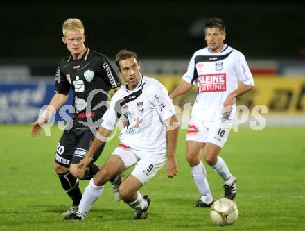 Fussball. Erste Liga. RZ Pellets WAC/St. Andrae gegen TSV Sparkasse Hartberg. Marco Reich, (WAC), Thomas Hopfer (Hartberg). Wolfsberg, 10.9.2010. 
Foto: Kuess

---
pressefotos, pressefotografie, kuess, qs, qspictures, sport, bild, bilder, bilddatenbank