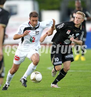 Fussball. Erste Liga. RZ Pellets WAC/St. Andrae gegen TSV Sparkasse Hartberg. Marco Reich, (WAC), Nejc Omladic (Hartberg). Wolfsberg, 10.9.2010. 
Foto: Kuess

---
pressefotos, pressefotografie, kuess, qs, qspictures, sport, bild, bilder, bilddatenbank