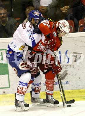 EBEL. Eishockey Bundesliga. KAC gegen VSV. SPURGEON Tyler (KAC),  MARTIN Michael (VSV). Klagenfurt, am 10.9.2010.
Foto: Kuess 

---
pressefotos, pressefotografie, kuess, qs, qspictures, sport, bild, bilder, bilddatenbank