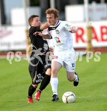 Fussball. Erste Liga. RZ Pellets WAC/St. Andrae gegen TSV Sparkasse Hartberg. Mathias Berchtold, (WAC),  Stefan Rakowitz (Hartberg). Wolfsberg, 10.9.2010. 
Foto: Kuess

---
pressefotos, pressefotografie, kuess, qs, qspictures, sport, bild, bilder, bilddatenbank