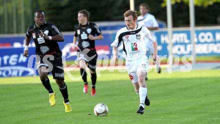 Fussball. Erste Liga. RZ Pellets WAC/St. Andrae gegen TSV Sparkasse Hartberg. Mathias Berchtold, (WAC), Wilfried Domoraud (Hartberg). Wolfsberg, 10.9.2010. 
Foto: Kuess

---
pressefotos, pressefotografie, kuess, qs, qspictures, sport, bild, bilder, bilddatenbank