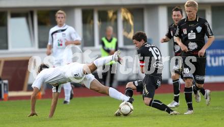 Fussball. Erste Liga. RZ Pellets WAC/St. Andrae gegen TSV Sparkasse Hartberg. Marco Reich, (WAC), Michael Koelbl (Hartberg). Wolfsberg, 10.9.2010. 
Foto: Kuess

---
pressefotos, pressefotografie, kuess, qs, qspictures, sport, bild, bilder, bilddatenbank