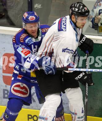 EBEL. Eishockey Bundesliga. EC Pasut VSV gegen Alba Volan SAPA Fehervar. Roland Kaspitz (VSV), Andras Horvath (Alba Volan). Villach, am 17.9.2010.
Foto: Kuess 


---
pressefotos, pressefotografie, kuess, qs, qspictures, sport, bild, bilder, bilddatenbank