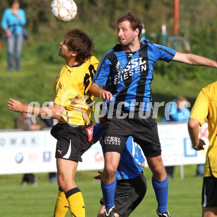 Fussball Kaerntner Liga. SG Nessl Drautal gegen VSV. Bernd Rudolf Huber (Drautal), Michael Kirisits (VSV). Feistritz/Drau, am 19.9.2010.
Foto: Kuess
---
pressefotos, pressefotografie, kuess, qs, qspictures, sport, bild, bilder, bilddatenbank