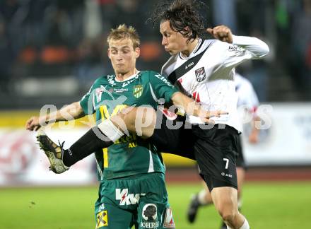 Fussball. Erste Liga. RZ Pellets WAC/St. Andrae gegen SC Austria Lustenau. Dario Baldauf, (WAC), Danijel Micic (Lustenau). Wolfsberg, 24.9.2010. 
Foto: Kuess

---
pressefotos, pressefotografie, kuess, qs, qspictures, sport, bild, bilder, bilddatenbank