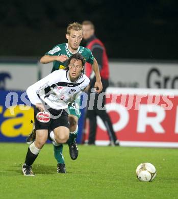 Fussball. Erste Liga. RZ Pellets WAC/St. Andrae gegen SC Austria Lustenau. Dario Baldauf,  (WAC),  Danijel Micic (Lustenau). Wolfsberg, 24.9.2010. 
Foto: Kuess

---
pressefotos, pressefotografie, kuess, qs, qspictures, sport, bild, bilder, bilddatenbank