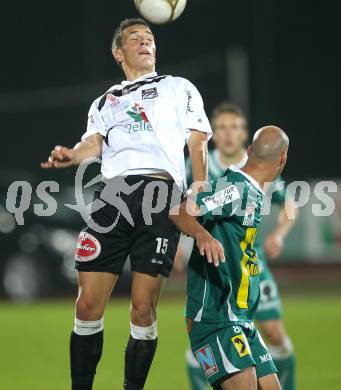 Fussball. Erste Liga. RZ Pellets WAC/St. Andrae gegen SC Austria Lustenau. Sanfro Gotal, (WAC), Harald Duerr (Lustenau). Wolfsberg, 24.9.2010. 
Foto: Kuess

---
pressefotos, pressefotografie, kuess, qs, qspictures, sport, bild, bilder, bilddatenbank